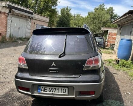 Чорний Міцубісі Аутлендер, об'ємом двигуна 2.4 л та пробігом 350 тис. км за 4500 $, фото 4 на Automoto.ua