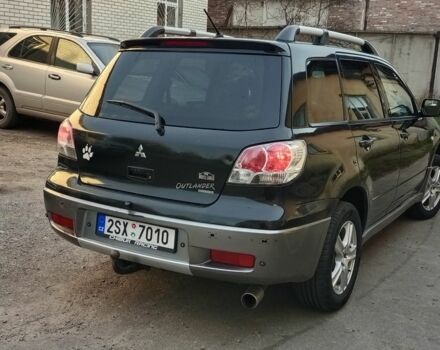 Чорний Міцубісі Аутлендер, об'ємом двигуна 0 л та пробігом 260 тис. км за 3750 $, фото 1 на Automoto.ua