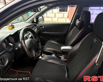 Черный Мицубиси Аутлендер, объемом двигателя 2.4 л и пробегом 357 тыс. км за 5190 $, фото 2 на Automoto.ua