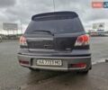 Черный Мицубиси Аутлендер, объемом двигателя 2.38 л и пробегом 340 тыс. км за 4650 $, фото 10 на Automoto.ua