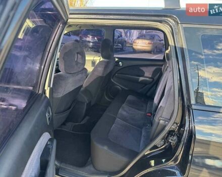 Черный Мицубиси Аутлендер, объемом двигателя 2.4 л и пробегом 351 тыс. км за 4999 $, фото 10 на Automoto.ua