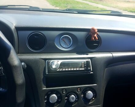 Черный Мицубиси Аутлендер, объемом двигателя 2.4 л и пробегом 270 тыс. км за 7800 $, фото 1 на Automoto.ua