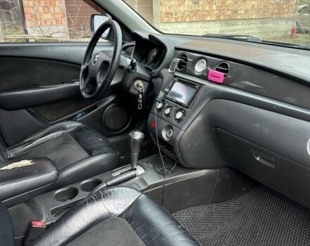 Черный Мицубиси Аутлендер, объемом двигателя 2.4 л и пробегом 258 тыс. км за 5400 $, фото 4 на Automoto.ua