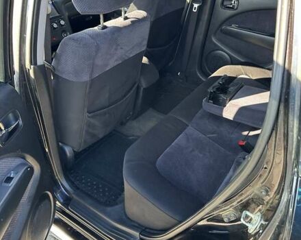 Черный Мицубиси Аутлендер, объемом двигателя 2.4 л и пробегом 307 тыс. км за 5600 $, фото 21 на Automoto.ua