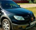 Чорний Міцубісі Аутлендер, об'ємом двигуна 2.4 л та пробігом 230 тис. км за 5600 $, фото 1 на Automoto.ua