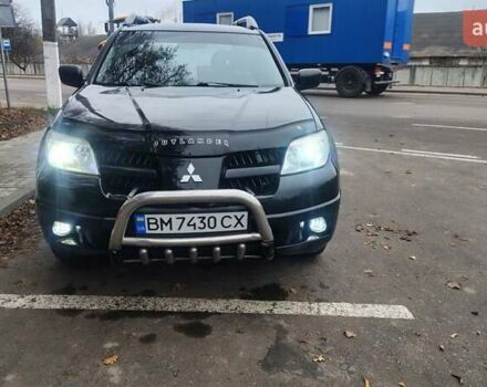 Черный Мицубиси Аутлендер, объемом двигателя 2 л и пробегом 330 тыс. км за 4997 $, фото 8 на Automoto.ua