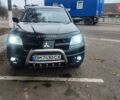 Черный Мицубиси Аутлендер, объемом двигателя 2 л и пробегом 330 тыс. км за 4997 $, фото 8 на Automoto.ua