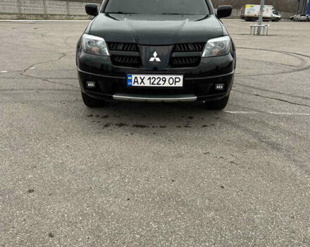 Чорний Міцубісі Аутлендер, об'ємом двигуна 2.38 л та пробігом 190 тис. км за 6800 $, фото 2 на Automoto.ua