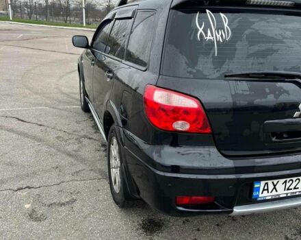 Черный Мицубиси Аутлендер, объемом двигателя 2.4 л и пробегом 190 тыс. км за 6800 $, фото 7 на Automoto.ua