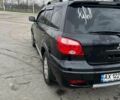 Черный Мицубиси Аутлендер, объемом двигателя 2.4 л и пробегом 190 тыс. км за 6800 $, фото 7 на Automoto.ua