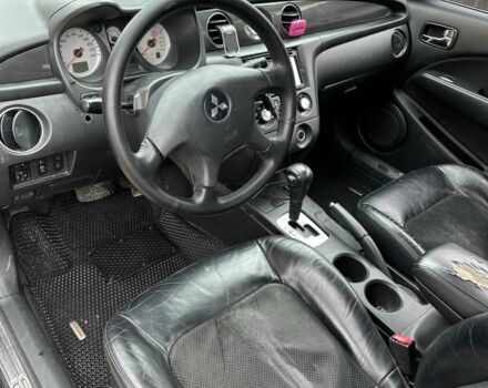 Черный Мицубиси Аутлендер, объемом двигателя 2.4 л и пробегом 258 тыс. км за 5400 $, фото 5 на Automoto.ua