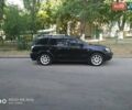 Черный Мицубиси Аутлендер, объемом двигателя 2 л и пробегом 256 тыс. км за 7400 $, фото 1 на Automoto.ua