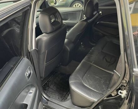 Черный Мицубиси Аутлендер, объемом двигателя 2.38 л и пробегом 270 тыс. км за 5900 $, фото 3 на Automoto.ua