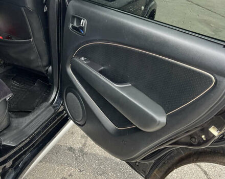 Чорний Міцубісі Аутлендер, об'ємом двигуна 2.38 л та пробігом 190 тис. км за 6800 $, фото 17 на Automoto.ua