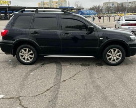 Черный Мицубиси Аутлендер, объемом двигателя 2.4 л и пробегом 190 тыс. км за 6800 $, фото 6 на Automoto.ua