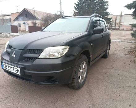 Черный Мицубиси Аутлендер, объемом двигателя 2 л и пробегом 495 тыс. км за 4400 $, фото 3 на Automoto.ua
