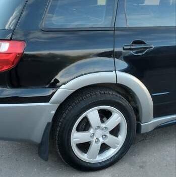 Міцубісі Аутлендер 2005 у Чернігові на Automoto.ua Чорний Міцубісі Аутлендер, об'ємом двигуна 2.38 л та пробігом 224 тис. км за 6000 $, фото 2 на Automoto.ua