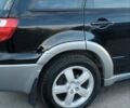 Міцубісі Аутлендер 2005 у Чернігові на Automoto.ua Чорний Міцубісі Аутлендер, об'ємом двигуна 2.38 л та пробігом 224 тис. км за 6000 $, фото 2 на Automoto.ua