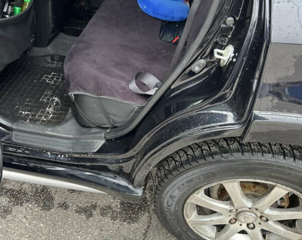 Чорний Міцубісі Аутлендер, об'ємом двигуна 2.38 л та пробігом 190 тис. км за 6800 $, фото 13 на Automoto.ua