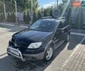 Черный Мицубиси Аутлендер, объемом двигателя 2 л и пробегом 169 тыс. км за 7600 $, фото 5 на Automoto.ua