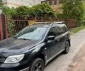 Черный Мицубиси Аутлендер, объемом двигателя 2 л и пробегом 310 тыс. км за 6500 $, фото 1 на Automoto.ua