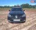 Черный Мицубиси Аутлендер, объемом двигателя 2.4 л и пробегом 250 тыс. км за 6000 $, фото 1 на Automoto.ua