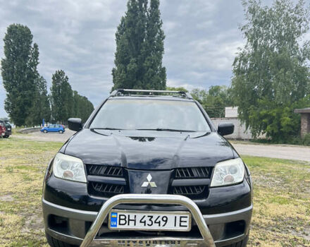 Чорний Міцубісі Аутлендер, об'ємом двигуна 2.38 л та пробігом 340 тис. км за 6299 $, фото 19 на Automoto.ua