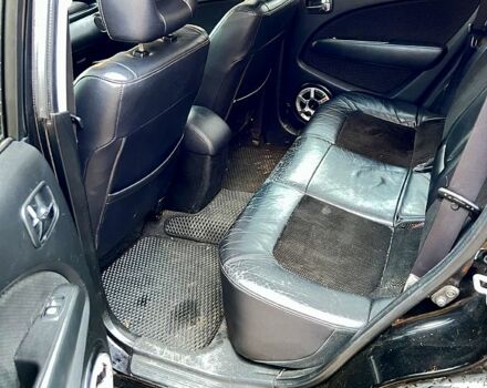 Чорний Міцубісі Аутлендер, об'ємом двигуна 2 л та пробігом 295 тис. км за 7500 $, фото 9 на Automoto.ua