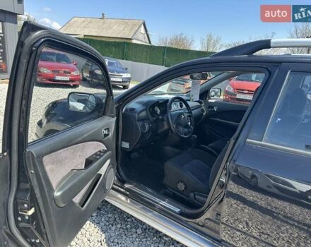 Черный Мицубиси Аутлендер, объемом двигателя 2.4 л и пробегом 204 тыс. км за 5390 $, фото 5 на Automoto.ua