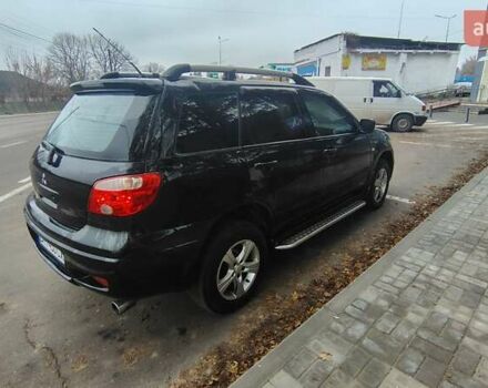Черный Мицубиси Аутлендер, объемом двигателя 2 л и пробегом 330 тыс. км за 4997 $, фото 3 на Automoto.ua