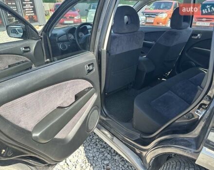 Черный Мицубиси Аутлендер, объемом двигателя 2.4 л и пробегом 204 тыс. км за 5390 $, фото 6 на Automoto.ua