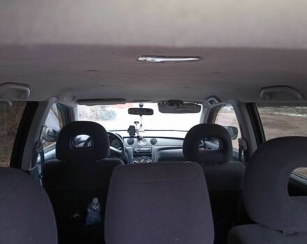 Черный Мицубиси Аутлендер, объемом двигателя 2 л и пробегом 495 тыс. км за 4400 $, фото 2 на Automoto.ua