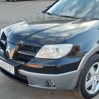 Міцубісі Аутлендер 2005 у Чернігові на Automoto.ua Чорний Міцубісі Аутлендер, об'ємом двигуна 2.38 л та пробігом 224 тис. км за 6000 $, фото 8 на Automoto.ua