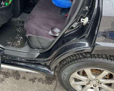 Черный Мицубиси Аутлендер, объемом двигателя 2.4 л и пробегом 190 тыс. км за 6800 $, фото 13 на Automoto.ua