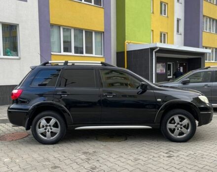 Черный Мицубиси Аутлендер, объемом двигателя 2.38 л и пробегом 270 тыс. км за 5900 $, фото 2 на Automoto.ua