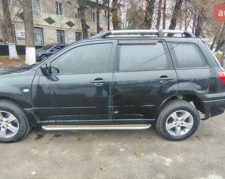 Черный Мицубиси Аутлендер, объемом двигателя 2 л и пробегом 330 тыс. км за 4997 $, фото 7 на Automoto.ua