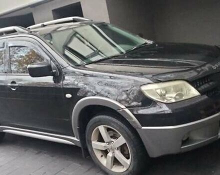 Черный Мицубиси Аутлендер, объемом двигателя 2 л и пробегом 380 тыс. км за 5000 $, фото 6 на Automoto.ua