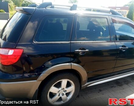 Черный Мицубиси Аутлендер, объемом двигателя 2.4 л и пробегом 270 тыс. км за 7800 $, фото 4 на Automoto.ua