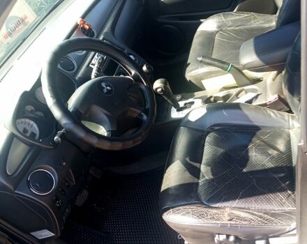 Черный Мицубиси Аутлендер, объемом двигателя 2.4 л и пробегом 270 тыс. км за 7800 $, фото 9 на Automoto.ua