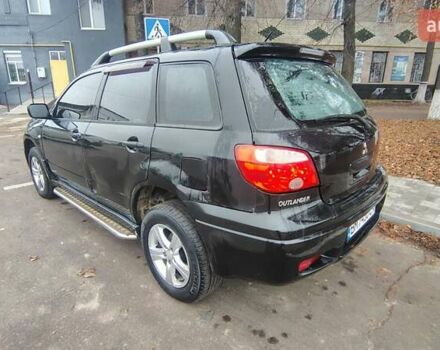 Черный Мицубиси Аутлендер, объемом двигателя 2 л и пробегом 330 тыс. км за 4997 $, фото 5 на Automoto.ua