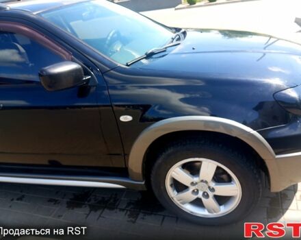 Черный Мицубиси Аутлендер, объемом двигателя 2.4 л и пробегом 270 тыс. км за 7800 $, фото 3 на Automoto.ua