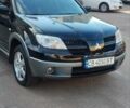 Міцубісі Аутлендер 2005 у Чернігові на Automoto.ua Чорний Міцубісі Аутлендер, об'ємом двигуна 2.38 л та пробігом 224 тис. км за 6000 $, фото 1 на Automoto.ua