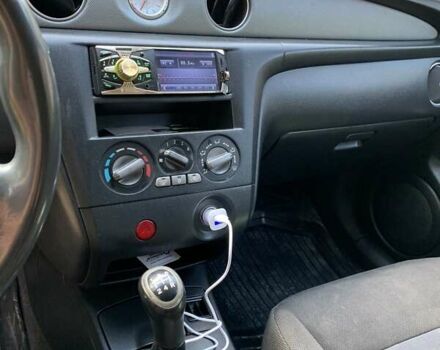 Чорний Міцубісі Аутлендер, об'ємом двигуна 2 л та пробігом 200 тис. км за 7000 $, фото 10 на Automoto.ua