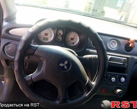 Черный Мицубиси Аутлендер, объемом двигателя 2.4 л и пробегом 270 тыс. км за 7800 $, фото 10 на Automoto.ua