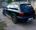 Черный Мицубиси Аутлендер, объемом двигателя 2.4 л и пробегом 260 тыс. км за 5900 $, фото 1 на Automoto.ua