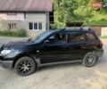 Чорний Міцубісі Аутлендер, об'ємом двигуна 2 л та пробігом 200 тис. км за 7000 $, фото 5 на Automoto.ua