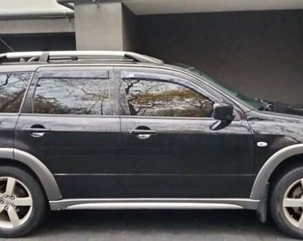 Черный Мицубиси Аутлендер, объемом двигателя 2 л и пробегом 380 тыс. км за 5000 $, фото 4 на Automoto.ua