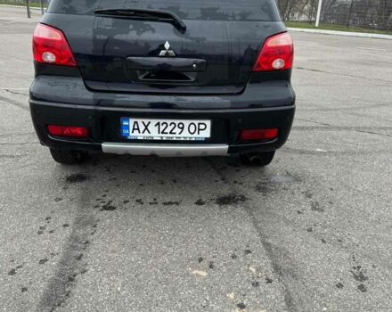 Черный Мицубиси Аутлендер, объемом двигателя 2.4 л и пробегом 190 тыс. км за 6800 $, фото 8 на Automoto.ua