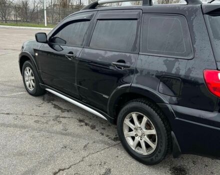 Черный Мицубиси Аутлендер, объемом двигателя 2.4 л и пробегом 190 тыс. км за 6800 $, фото 9 на Automoto.ua