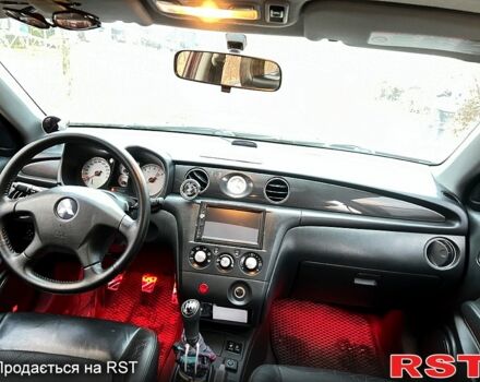 Черный Мицубиси Аутлендер, объемом двигателя 2 л и пробегом 295 тыс. км за 7500 $, фото 6 на Automoto.ua